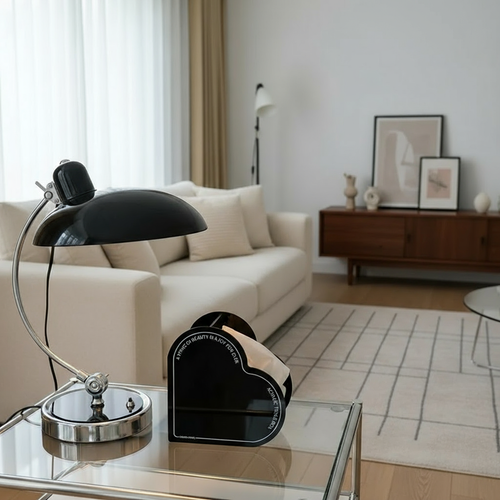 Bent Metal Table Lamp – Light Falls Sideways Out of the Curve – Image 1